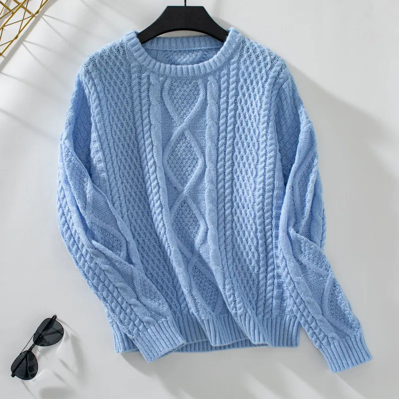 Pull en tricot torsadé uni