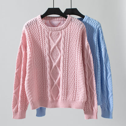 Pull en tricot torsadé uni